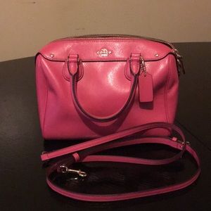 Hot pink Coach purse with shoulder strap